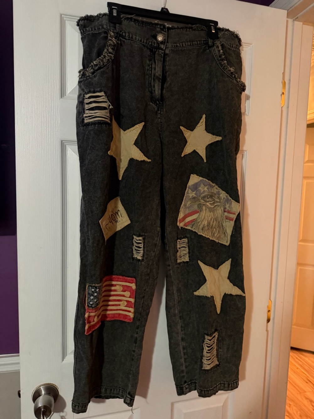 A Rare Bird Black Distressed Patchwork Jeans with Stars and Flag Accents